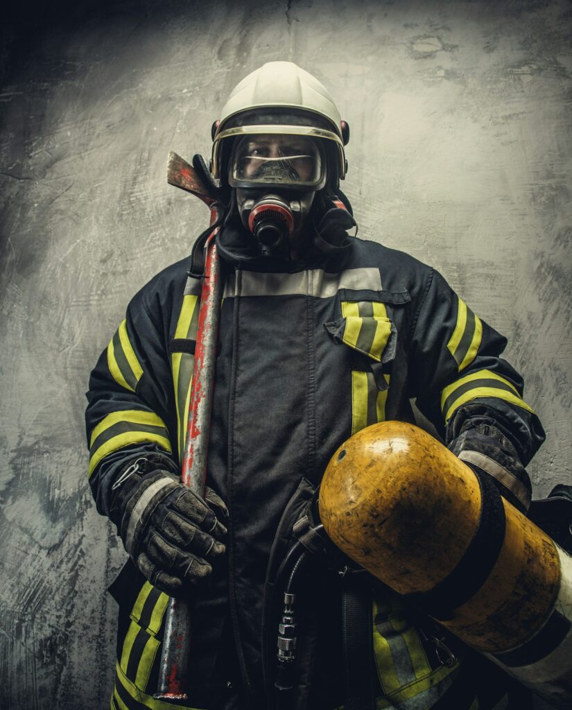 Portrait of firefighter in safety uniform.